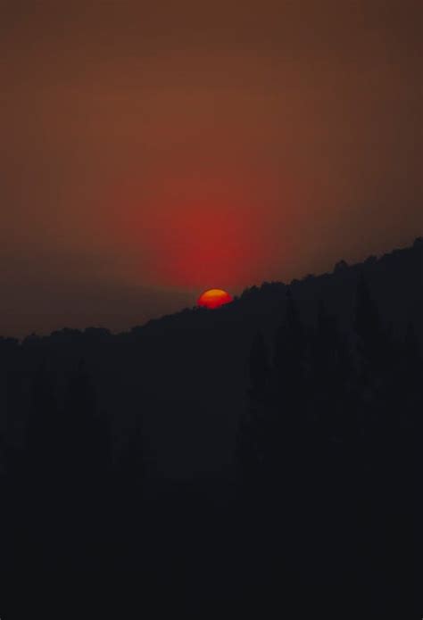 Silhouette of Mountain during Sunset · Free Stock Photo