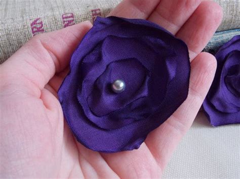Eggplant purple flower for wedding decor and hair accessories. Singed satin and hand sewn pearl ...