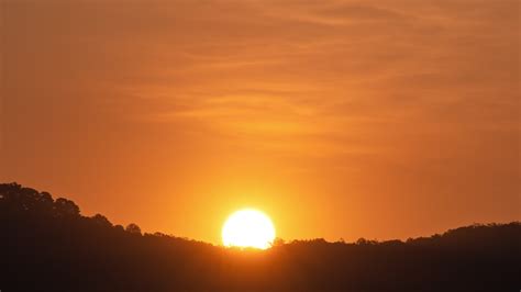Beautiful Clear Big Sun at Sunrise or Sunset, cloud and sky nature landscape scence. 4K footage ...