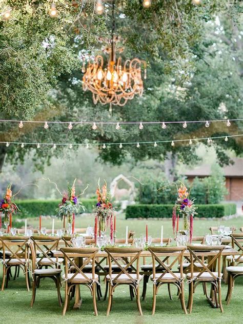 Outdoor chandelier in trees rustic #adelaideweddinglighting #adelaideweddings Outdoor Wedding ...