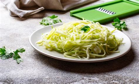 Premium Photo | Raw green uncooked zucchini pasta