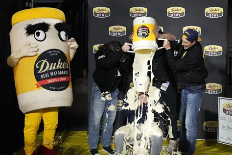 West Virginia’s Neal Brown Drenched in Mayonnaise After Duke’s Mayo Bowl Victory Over North ...