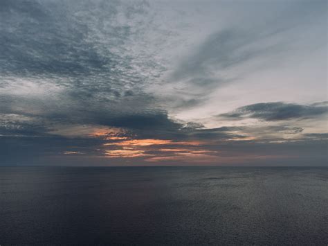 Drone photo of sunset at sea – free photo on Barnimages