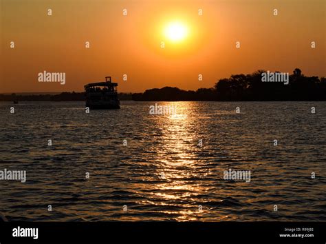 Sunset Cruise on the Zambezi River, Zimbabwe Stock Photo - Alamy