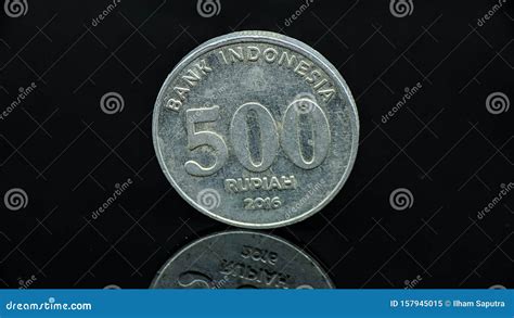 Indonesia Rupiah Coins Close Up on Black Background with Reflection ...