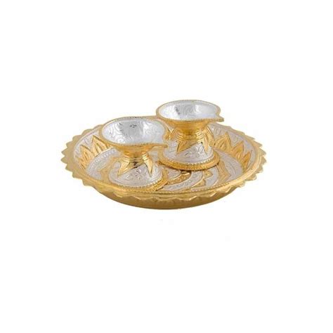 A beautiful aarti set that includes one aarti plate and two diyas ...