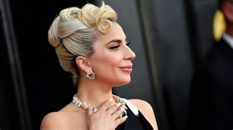 Lady Gaga reacts to 2023 Oscar nomination for her song 'Hold My Hand' - ABC News