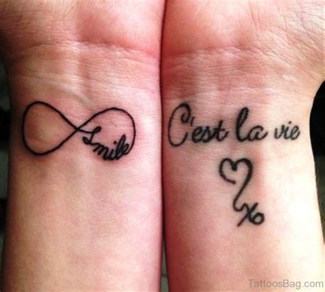 30 Cheerful 'Be Happy' Tattoo Designs - Body Art Guru