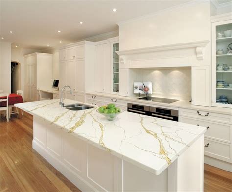 White kitchen countertops with golden vein (With images) | Quartz kitchen countertops white ...