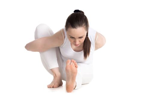 Should The Sit Bones Be Down In Marichyasana? - Yoganatomy