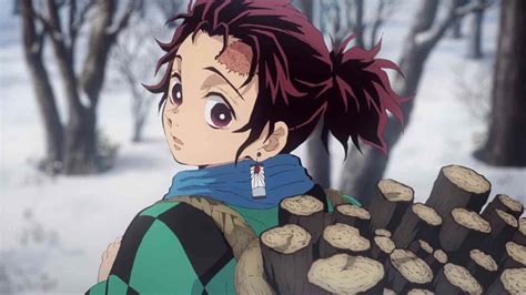 Download Demon Slayer Anime Tanjiro Kamado With Wood Picture | Wallpapers.com