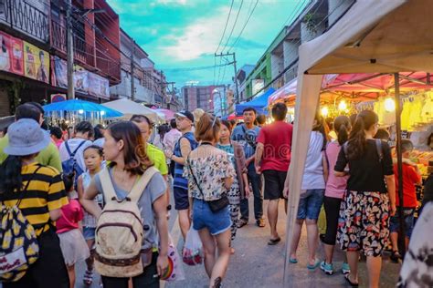 Unacquainted Tourists Walking In Chiang Mai Night Market Walking Street ...