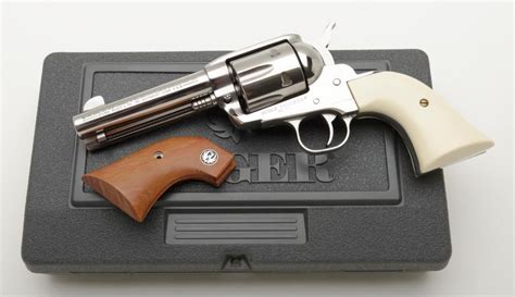 Ruger Vaquero, .45 long colt caliber Single Action revolver with 4 ¾” barrel, stainless steel, simul