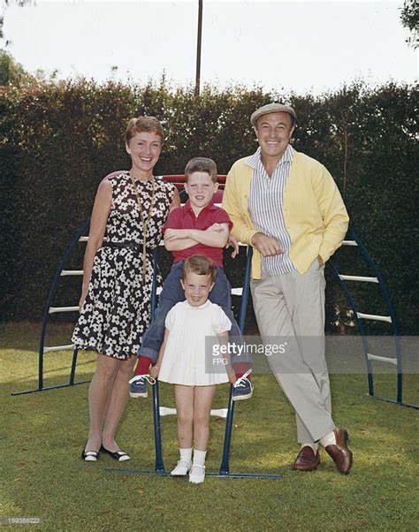 American actor, dancer and singer Gene Kelly (1912 - 1996) with his ...