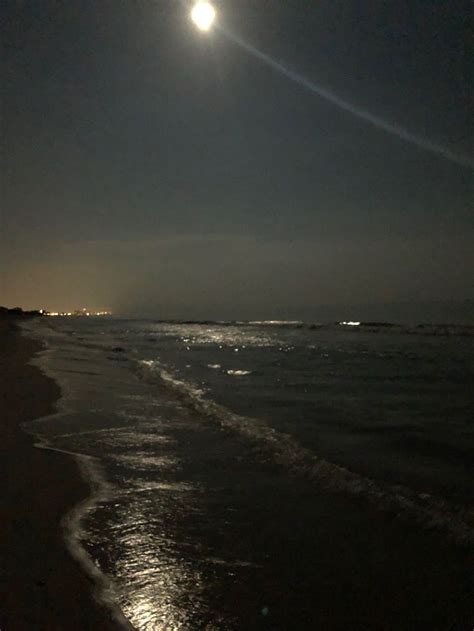 Moonlight walks on the beach | Ocean at night, Beach at night, Sky ...