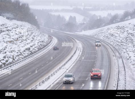 A view of the A419 / A417 by pass with vehicles travelling very slowly in the dangerous road ...