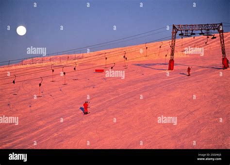 FRANCE, ISERE (38) LES DEUX ALPES SKI RESORT, FULL MOON ON THE TOP OF THE MOUNTAIN Stock Photo ...