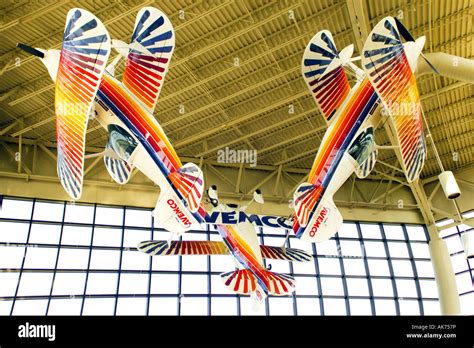 Pitts Special aerobatics planes hang from the ceiling at the EAA museum ...