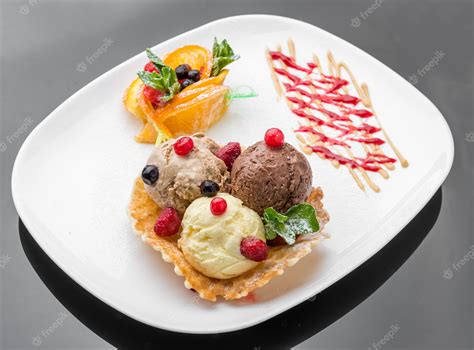 Premium Photo | Ice cream sundae, waffle cone and sliced strawberry