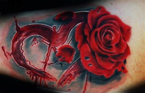 Mystical big bloody red heart with rose tattoo on arm - Tattooimages.biz