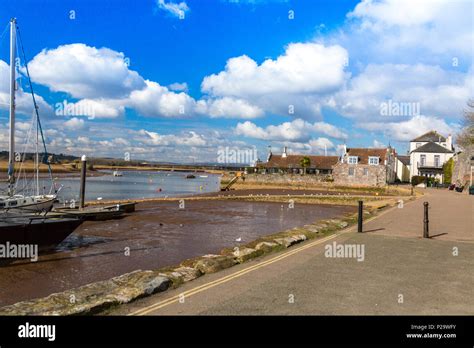 The waterfront of the River Exe at low tide at Topsham, Devon, England ...