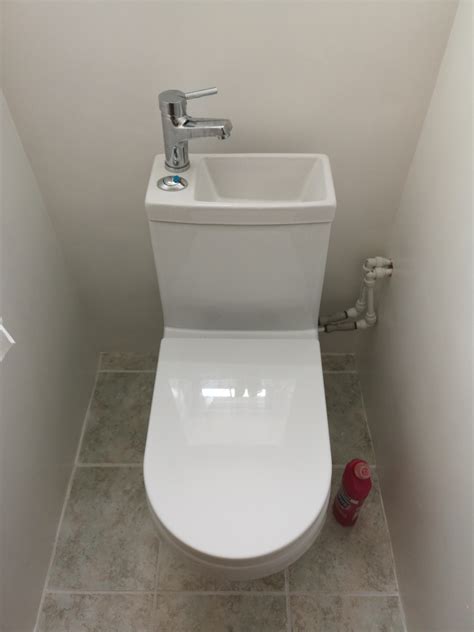 My sister's toilet with a built in hand basin - it uses the waste water ...