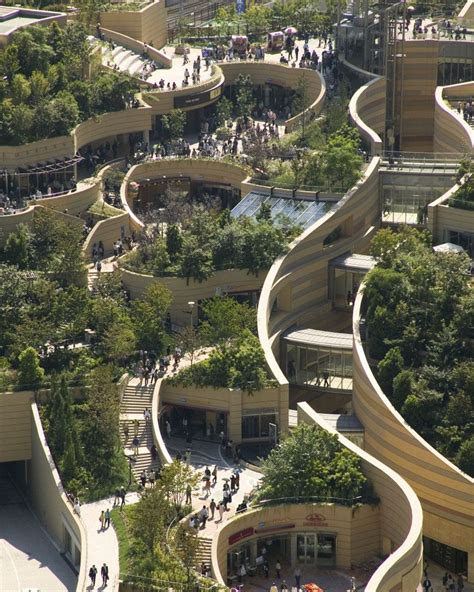 Pockets of organically layered green space by a skyscraper in Namba Parks (なんばパークス Nanba Pākusu ...