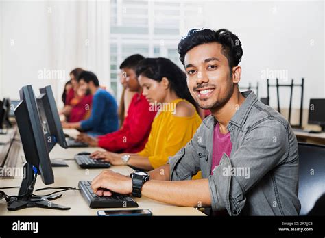 Young Male College Student Using Computer Studying E-Learning Education ...