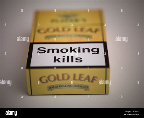 Tobacco health warning Stock Photo - Alamy