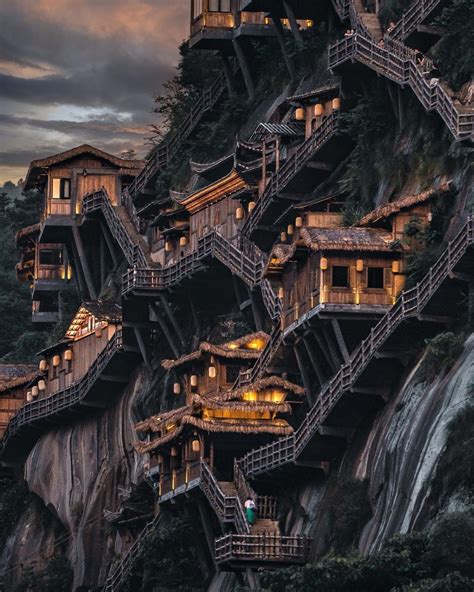 Wangxian Valley with houses hanging on its cliff. 📸 hwang199 : r ...