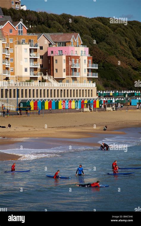 Waiting for the surf at Boscombe surf reef Stock Photo - Alamy