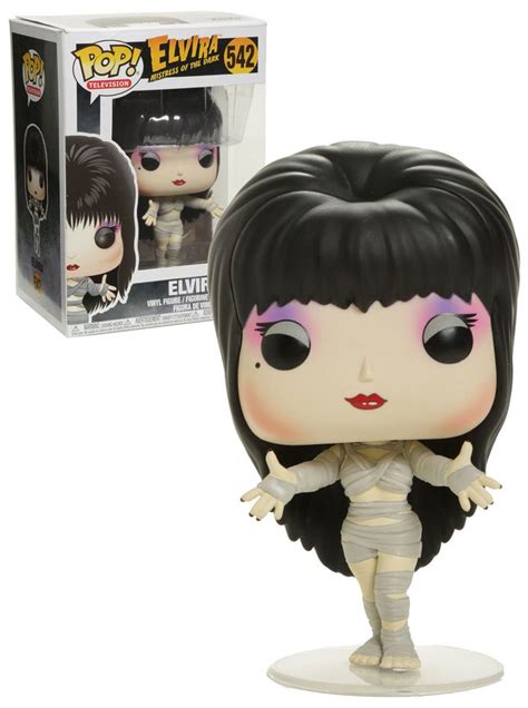 an evila pop vinyl figure in front of a box