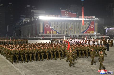 North Korea's military parade replaces missiles with paramilitaries