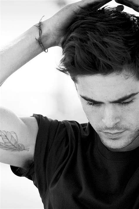 Feather Tattoos for Men | Feather tattoo for men, Zac efron, Zac efron style