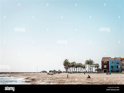 People relaxing on the Villajoyosa beach Stock Photo - Alamy