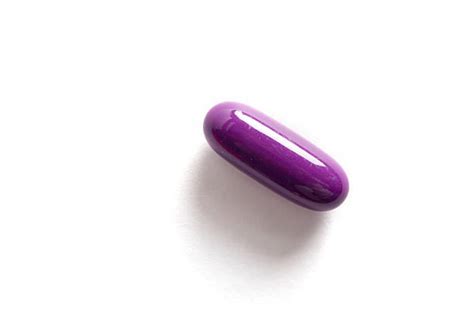 Best Purple Pills Stock Photos, Pictures & Royalty-Free Images - iStock