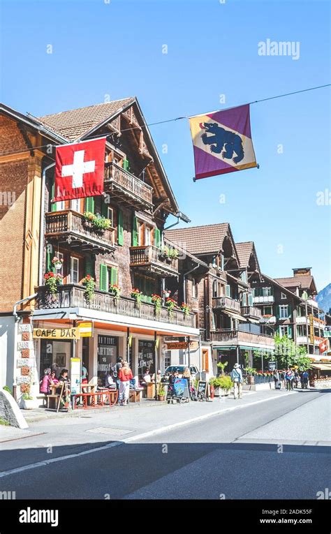 Lauterbrunnen, Switzerland - July 16, 2019: Main street in beautiful Alpine village ...