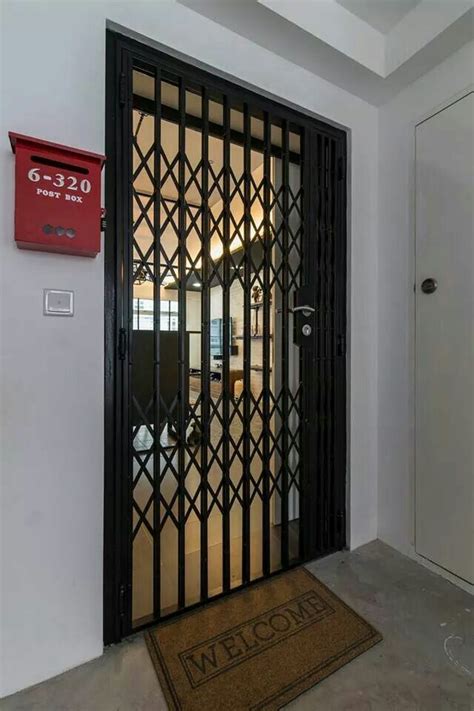 Vintage gate at the entrance of a HDB Flat. I like! | Grill door design, Grill design, Door design