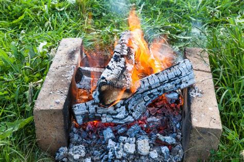 Fire burning in a campfire stock image. Image of campfire - 33341387