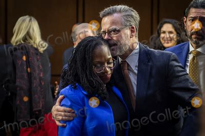 Photos and Pictures - Judge Ketanji Brown Jackson is embraced by her husband Patrick Jackson ...