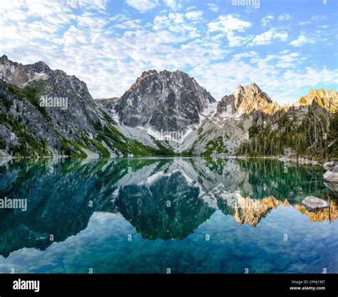 Sunrise Illuminates Dragontail Peak, Colchuck Peak and Asgaard Pass Above the Torquise Waters Of ...