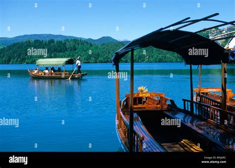 Slovenia lake Bleder boats tourists Bleder lake Stock Photo - Alamy