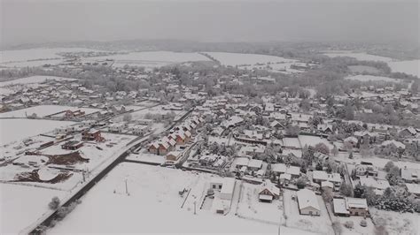 Aerial View of A Snowy Village in 4K 1944127 Stock Video at Vecteezy