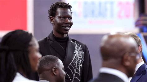 Bol Bol Steals NBA Draft With Incredible Spiderweb Suit [Photo] | Heavy.com