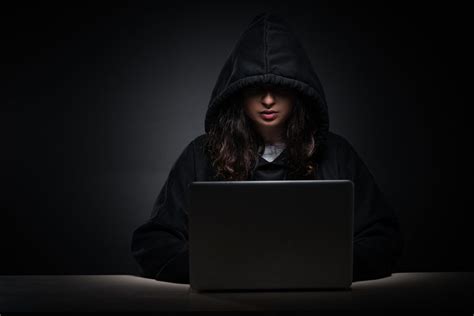 Female hacker hacking security firewall late in office - Palmetto ...