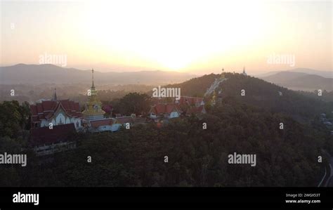 A sunrise view of castle and mountains Stock Photo - Alamy