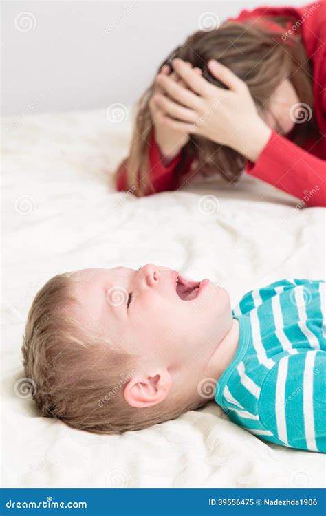 Mother Is Tired, Child Is Crying Stock Photo - Image: 39556475