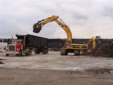 Caterpillar Excavator with Grapple Loads Scrap Metal | Flickr