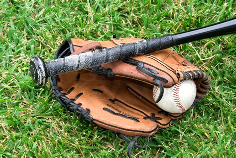 Baseball equipment on grass – Hoover Church of Christ