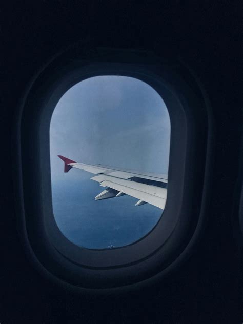 View of wing from airplane window · Free Stock Photo